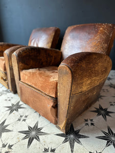 A Fine Pair of Elegantly Knackered French Leather Club Chairs