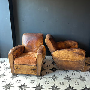 A Fine Pair of Elegantly Knackered French Leather Club Chairs