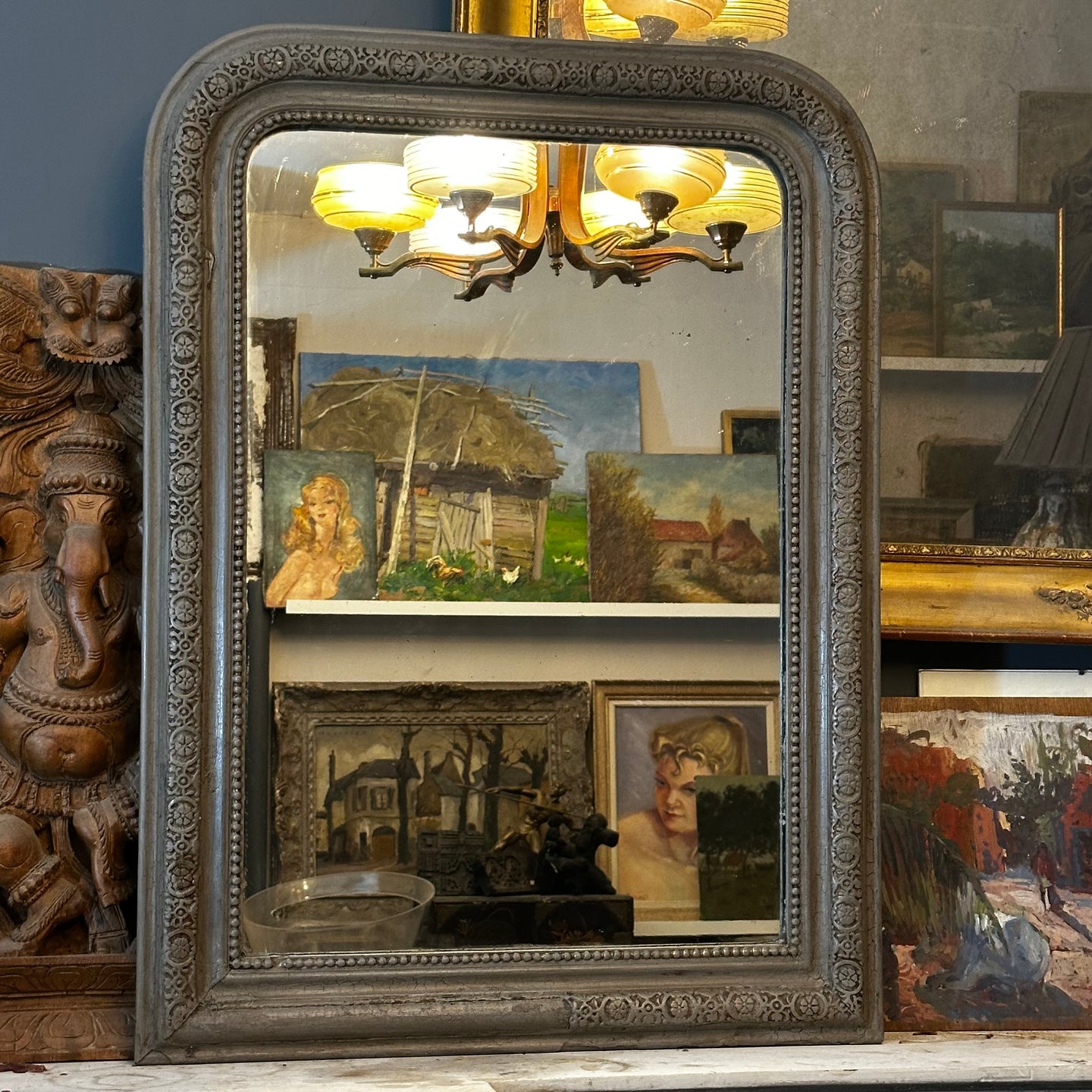 Antique French Louis Philippe mirror with carved frame, traces of faded gilt, and original beveled glass c.1880
