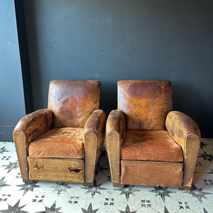 A Fine Pair of Elegantly Knackered French Leather Club Chairs